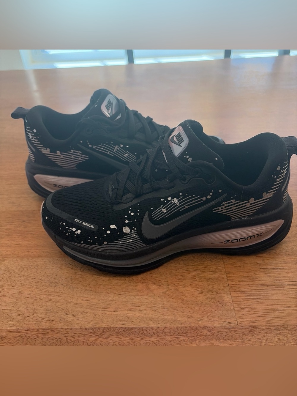 Nike Black Running Shoes with White Speckle Accents